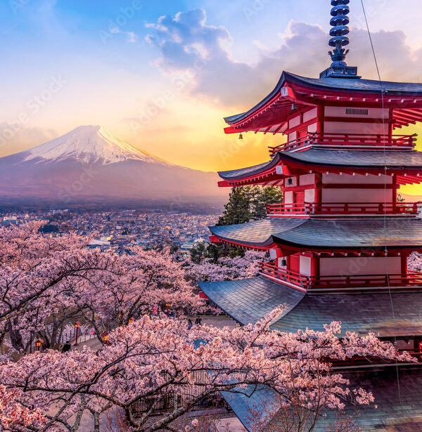 Fujiyoshida, Japan Beautiful view of mountain Fuji and Chureito pagoda at sunset, japan in the spring with cherry blossoms