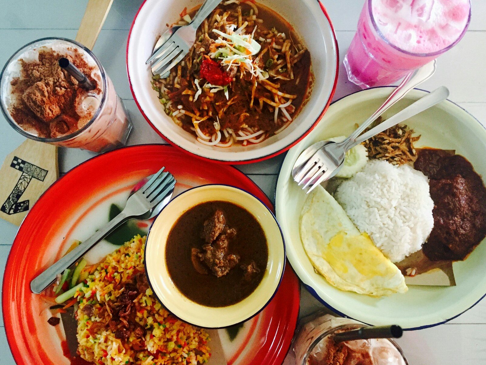 Photo by Damia Mustafa - Best Travel and Cruise New Zealand cooked dishes on plates
